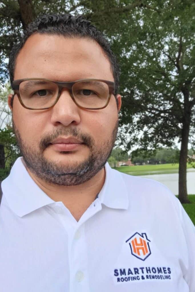 Our CEO Franklin Laya wearing the white uniform, glasses and beard, with a lake behind. That location is near our office in Sharpstown.